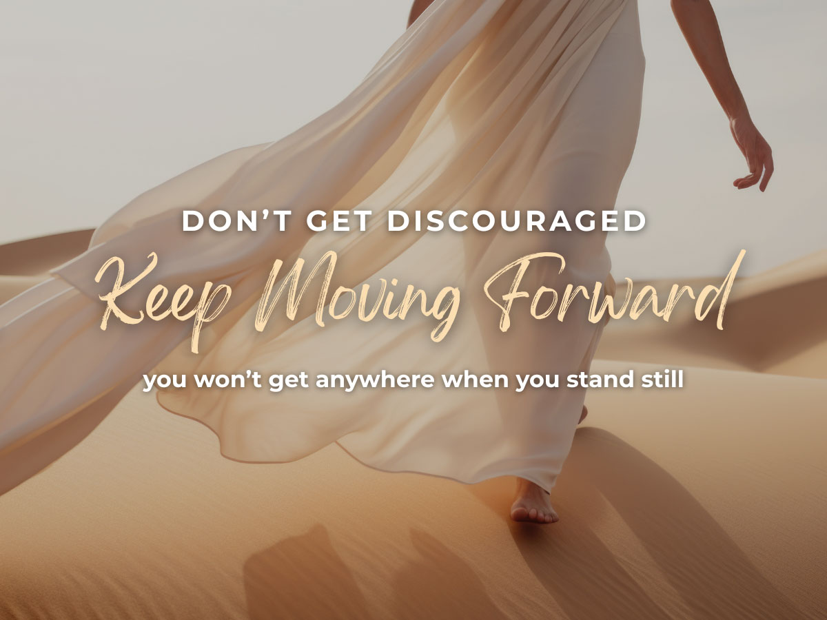 Web.KeepMovingForward.WomanWalkingInSand.Image